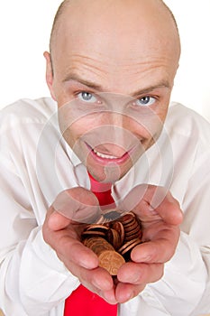 Businessman with pile of coins