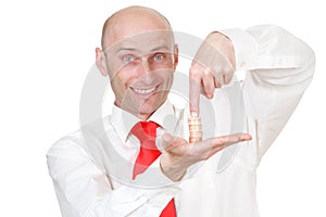 Businessman with pile of coins