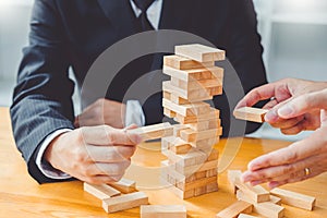 Businessman plan and strategy in business Domino Effect Problem