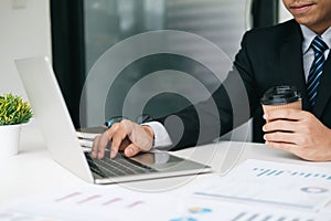 Businessman planning and analyse investment marketing data