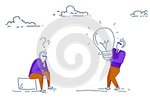 Businessman planning hold light lamp new idea innovation concept leader question marks thinking hardworking process