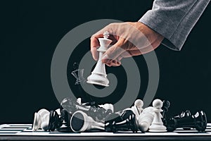 Businessman play with chess game. concept of business strategy and tactic.strategy, management or leadership concept