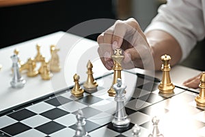 Businessman play with chess game. success management concept of business strategy and tactic challenge