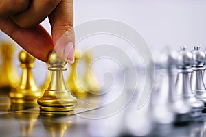 Businessman play with chess game. success management concept of business strategy and tactic challenge