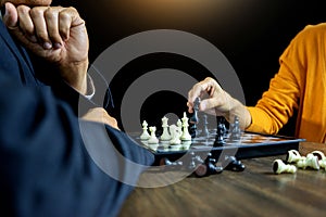 Businessman play chess how to crash overthrow the competitor