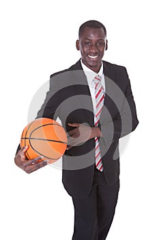 Businessman Playing Basketball