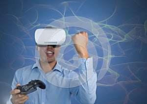 Businessman playing with computer game controller with virtual reality headset with squiggles backgr
