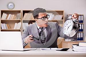 The businessman playing computer games at work office