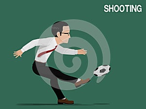 A businessman is playing football