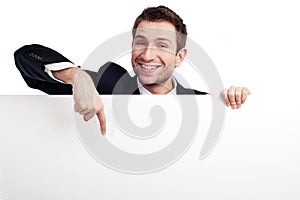 Businessman pointing at billboard