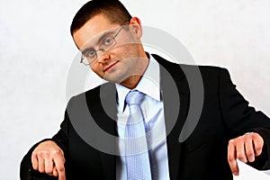 Businessman pointing down