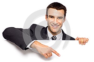 Businessman pointing finger photo