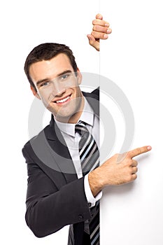 Businessman pointing finger photo