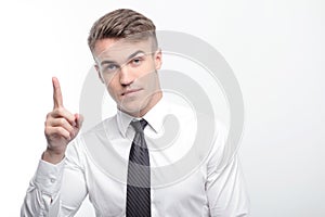 Businessman pointing with his index finger