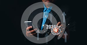 Businessman pointing target goal virtual screen 2024