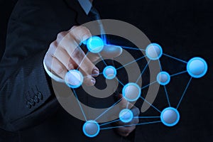 Businessman pointing to social network structure