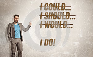 Businessman pointing to text, I could, should, would, I do