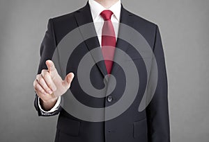 Businessman pointing or touching something