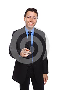 BUSINESSMAN POINTING TOWARDS THE CAMERA