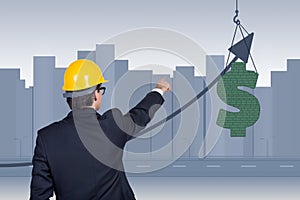 Businessman points to dollar