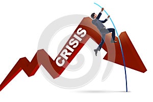 The businessman pole vaulting over crisis in business concept