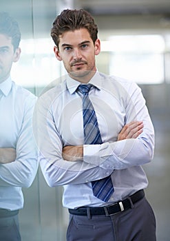 Businessman, portrait and confident with arms crossed in office for professional career in finance, serious and pride