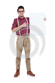 Businessman, portrait and pointing to blank, paper or billboard in studio, space and white background. Face, employee
