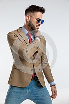 Businessman posing with macho vibe