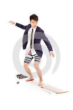 Businessman practice surfing pose