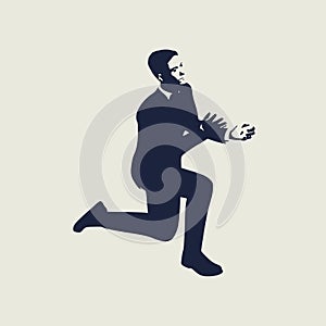 Businessman in prayer pose.