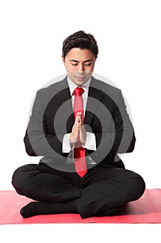 Businessman praying