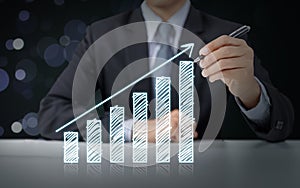 Businessman present graph with growth