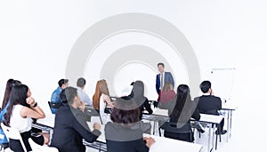 Businessman presentation in a conference meeting room and audience of the lecturer