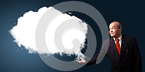 Businessman presenting abstract cloud copy space