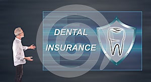 Businessman presenting a dental insurance concept on a wall screen