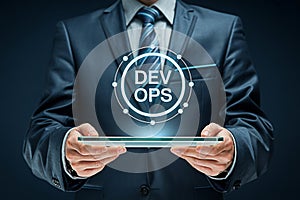 Businessman presents devops concept on a digital tablet for modern software development and it operations