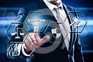 Businessman pressing button on touch screen interface and select international law