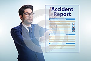 Businessman pressing buttons on virtual accident report