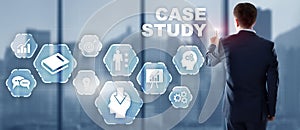 Businessman pressing case study button on virtual screens