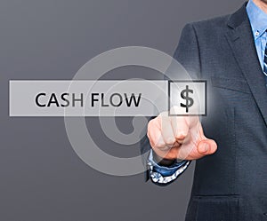 Businessman pressing Cash Flow button on virtual screens