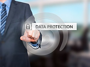 Businessman pressing Data Protection button on virtual screens