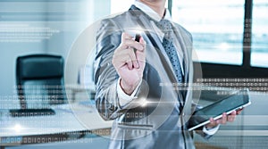 Businessman pressing on digital virtual screen