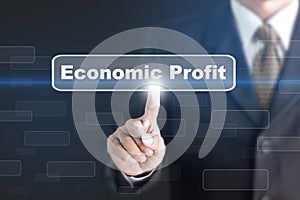 Businessman pressing a Economic Profit concept button.