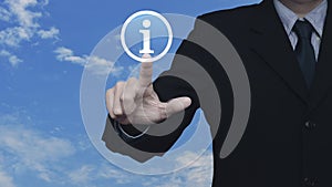 Businessman pressing information sign flat icon over blue sky with white clouds, Business customer service and support concept