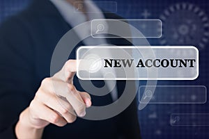 Businessman pressing a NEW ACCOUNT concept button.