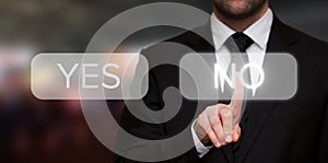 Businessman pressing No button