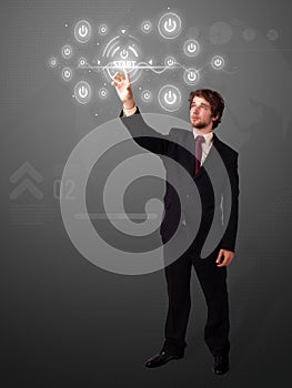 Businessman pressing simple type of start buttons