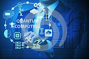 The businessman pressing virtual button in quantum computing concept