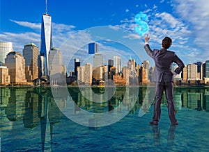 The businessman pressing virtual dollar button