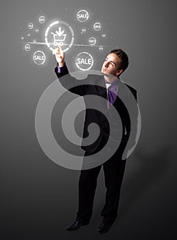 Businessman pressing virtual promotion and shipping type of icon